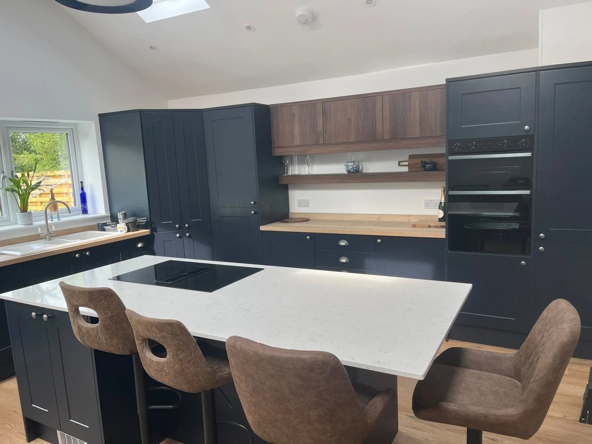 Navy shaker kitchen with quartz island and walnut cabinets, Wyton
